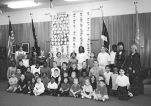  Mrs. Hall’s (2nd from right), morning Kindergarten Class and Mrs. Schopfer’s fourth grade class. Student teacher, Angie Cope is far right.