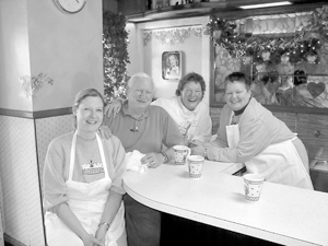 New Owners of The Waynedale Bakery (l to r) Christine Miller, Hal and Fran Clinger learning baking secrets from Bonnie Harris.