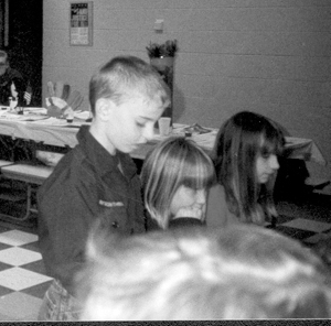 Raymond Andrew McCune - Cub Scout Pack 3025’s newest member preparing to enjoy his meal at the Pack’s Blue & Gold Banquet.)