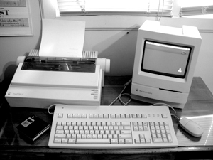 The Macintosh Classic with an Imagewriter II Printer.