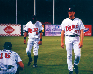 photo by Cindy Cornwell	 Florida Spring Training Twins warmup prior to game against St. Louis Cardinals – Ft. Myers, FL. Positions set in stone for the 2002 season: #16 Doug Mientkiewicz will be playing 1st base. Luis Rivas #2 will start at second base. #47 Corey Koskie third base.
