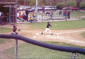 #5, Zach Ryan of East Chicago Pizza, takes a swing during the Prep game Thursday, April 30th, 2002. 
