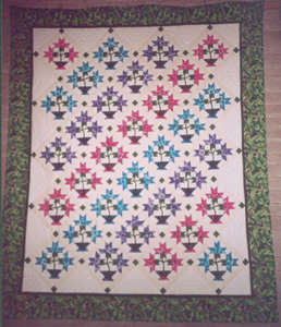 The Healing Garden Quilt—-Made with love and tears in memory of loved ones .