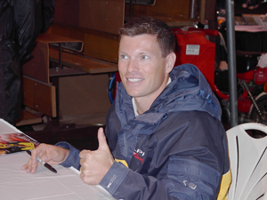 photo by Cindy Cornwell IRL Points Leader Scott Sharpe from Kelley Racing Team was on hand signing autographs at Kruse Auction Park.  Scott said he was in great shape for the opening day on Sunday at the Indianapolis 500 Motor Speedway.  He posted the team’s fastest lap in testing, at 226.2 mph.  Last year, Scott was challenging for the lead until mechanical problems knocked him out.