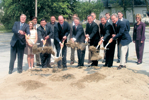 photo by rls GROUNDBREAKING CEREMONY FOR TOWERpark expected to open in the fourth quarter of 2003. Front row (l-r): Phil Laux-Chamber of Commerce, Rachel Romary, Mike Romary-MER Group (Developer), Curt Brown-President of Tower Bank, Mayor Graham Richard, Jeff Krivacs-VP Tower Bank and future Waynedale Branch Manager, Kevin Himmelhaver-CFO Tower Bank and Councilman Tom Hayhurst. Back row (l-r): Jeff Hile-MSKTD Architects, Mike Kinder-Kinder Construction, Wendell Bontrager, Darrell Blocker-VP Tower Bank, Michael Rice, Lee DeTurk and Lori Hoffman-from Tower Bank.