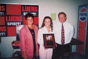 (l-r) Lisa Palmer, Bishop Luers Scholarship recipient Mo Korte, and Mike Palmer