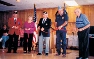 David Parrish American Legion Post 296 Celebrates Re-Opening After Flood 2003 (L-R) Tim Pape, Robert Ripley 4th District Commander, Karen Dumont President 296 Auxiliary, Larry Thiele Post 296 Commander, Denny Cunningham S.A.L. Post 296 Commander, and State Representive Ben GiaQuinta cut the ribbon on Saturday, October 18, 2003.