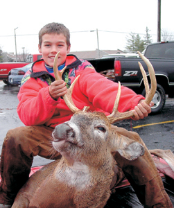 Proud Young Blood Tucker Smith shot his first deer with a muzzleloader. DNR Biologist Boszor estimated this deer to be about 2.5 years of age; based on the wear and number of teeth, and the size of antlers. Tucker’s deer will be processed into brats and strips of steak. Tucker says the only kind of brats he likes are deer brats. Tucker is a student at Summit Middle School.