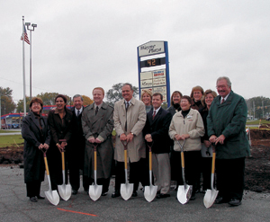 Participating in the MidWest Federal Credit Union groundbreaking ceremony were:  (l-r) Regina Romary-owner Wayne Plaza Shopping Center, Divya Rajdev-Waynedale Branch Manager, Ed Romary-General Contractor, John McGauley-Allen County Public Information, Al Moll-Fort Wayne Controller, Maureen Fulk-AVP Branch Operations, Scott Taylor-VP Membership FW Chamber, Paige Condo-Designer Romary Associates, Justine Coudret-Kramer-Director MidWest America, Sallie Trimble-Exec. VP MidWest America, Wendy Adams-Mgr of Facilities MidWest America, and Charles D. Bitler-President/CEO MidWest America.