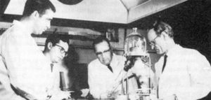(Top, L-R) Gene Meeks, George Bain, Frederick R. Furth, and Philo T. Farnsworth, inventor with 1962 fusor.