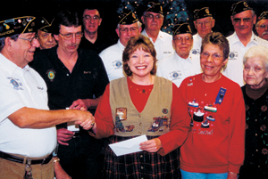 Charles Rathsack, Commander of American Legion Post 241 in Waynedale presented a check for $1,500.00 to Jane Avery, Executive Director of Community Harvest Food Bank of Northeast Indiana, Inc. to help provide for the needs of hungry people in our area. ‑The need for food this year is more than double what it was a year ago. Many people are needing to ask for food help for the first time in their lives due to the flood and many job losses in our area.