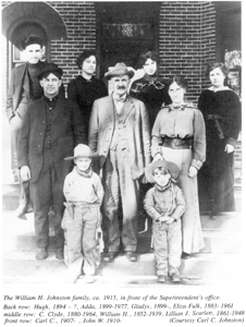 (photo courtesy of Carl C. Johnston) The William H. Johnston family, ca. 1915, in front of the Superintendent’s office. Back row: Hugh, 1894-?; Adda, 1899-1977; Gladys, 1899-?; Eliza Fulk, 1883-1961. Middle row: C. Clyde, 1880-1964; William H., 1852-1939; Lillian J. Scarlett, 1861-1948. Front row: Carl C., 1907-?; John W. 1910-?.