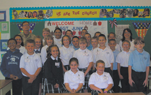 Fourth grade students at St. Joseph-St. Elizabeth Catholic School, Brooklyn Ave. welcome back Master Sergeant Michael Junk from his deployment in Afghanistan.