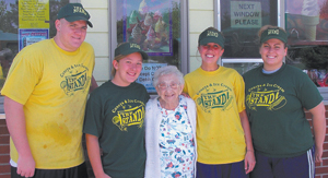 Ryan Palmer, Ashley Epperson, Abby Wolfe and Lynette Pinkerton take a break from their busy routine at The Stand to wish Agnes a Happy 102nd birthday on Monday, June 26, 2006.