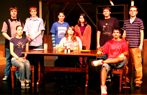 The cast of “The Diary of Anne Frank” is in rehearsal at Elmhurst High School for a December 7th opening. Standing: Jayson Barrand, Paul Berghoff, Sarah Smith, Becca Coffelt, Brandon Meuchel, and Peter Schnellenberger. Seated: Elizabeth Burris, Lauren Marlow, and Luke Somers.
