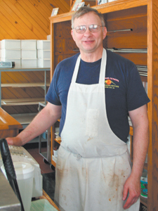 Pat Pedden at his familiar place behind the counter at Karen’s Kitchen on Bluffton Road. 