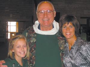 Erin’s House provides support services for children, teens and their families who anticipate or have suffered the death of a loved one. Pictured Annie Childers, Fr. Tim Wrozek, Katie Burns.