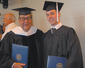 (L-R) University of St. Francis graduates Mr. James Shields-doctoral degree and Alex Cornwell-bachelors degree from School of Creative Arts.