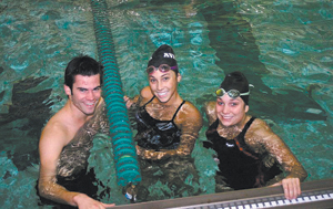 Luers’ swim team seniors Jake Crouch(L),  Nichole Landon (C), Erin Conroy (R) enjoying practice.