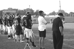 Bishop Luers’ Friday night football opener against Snider High School, August 19, 2011. Emeritus Bishop John D’Arcy cheering on the Knights to a victory with a final score 32-21.