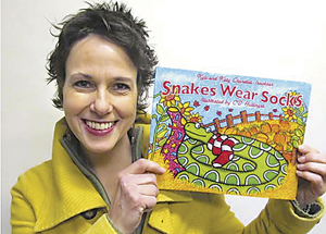 CD Hullinger, native of Fort Wayne is coming to area elementary schools to present her new children’s book called Snakes Wear Socks. 