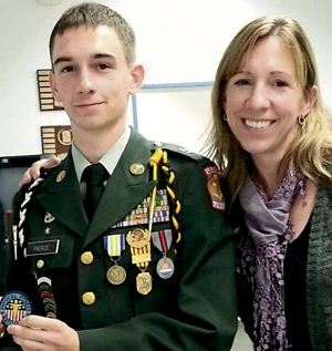 Jackson receiving the Army Physical Fitness Award from Major Parker for scoring a 298 on his APFT on June 6th, 2012. To quote his dad: “BAM. That. Just. Happened.” (Pictured with his mother, Melissa Quake S’Chevalier)