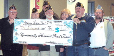 From the left: Commander Kenneth Holloway, 1st Vice Commander Steve Epperson, far back: Adjunct Ray Walter, Fount Finance Steve Lantz, Auxiliary President Diana West, 2nd Vice Commander Bill Stowe, Sons of the American Legion Commander Mike Shuler.