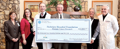 Parkview Research Center’s Prostate Cancer Survivorship program received  proceeds from Blue Ball Open Golf Outing. L-R Rae Gonterman - Sr. VP Cancer Service, Sasha Carrasquillo - Parkview Foundation, Dr. John Crawford, Co-Chairs Kent Hormann and Cynthia Cornwell and Dr. Michael Mirro, Medical Director.