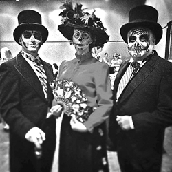Raul Perez and Lyndsay Sheets costumed as Calavera del Catrin and Calavera de la Catrina and Palermo Galindo as El Muerto at the Fort Wayne Museum of Art’s Dias de los Muertos festivities. Their makeup designs by Teresa Rust (The Gypsy Face Painter) who also painted the faces of the many visitors to the FWMoA.
