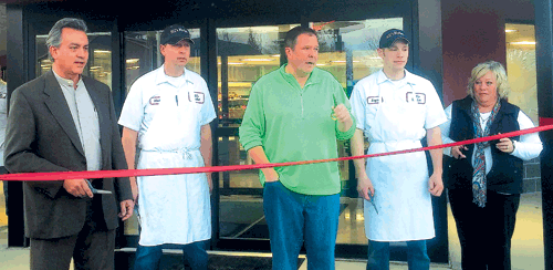 Hill’s Meat Market celebrated their new store’s grand opening on February, 1 2016.  The ribbon cutting ceremony was lead by Chuck Hill (middle).