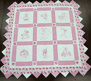 Phyllis Crawford’s quilt “It’s a Child’s World” won over the judges as the quilt best exemplifying the theme “Pink the Color of Spring.”