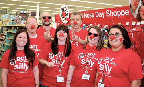 Walgreens employees on Bluffton Road wearing Red Noses in support of Red Nose Day Fund. Walgreens-the corner of happy and healthy-helping to fight kids’ poverty.