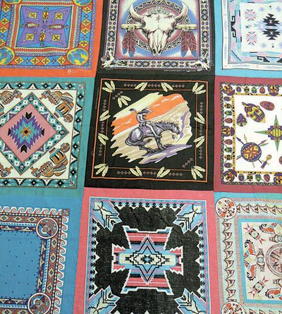 Joan’s bandana quilt top is in need of machine quilting so she can give it to her grandson before dying.