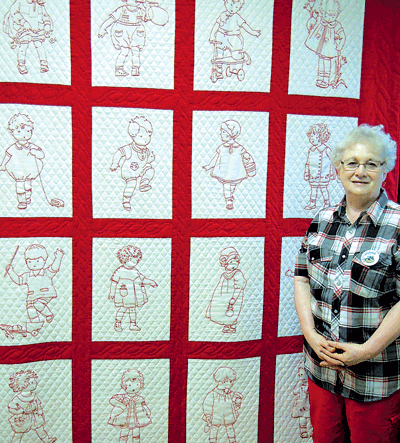 Darlene Williams redwork quilt featuring “Childhood Memories” designs was awarded third place in the People’s Choice competition at the MVAGSA Summer Show.