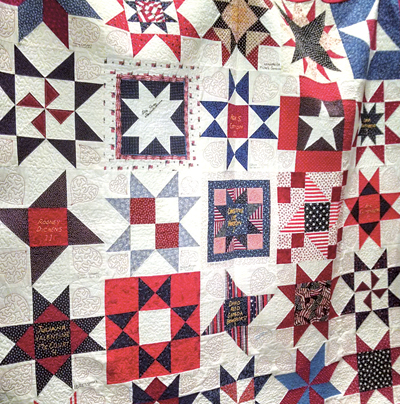 People from around the world created star quilt blocks to commemorate the lives lost on 9/11.  ~ Photo credit:  Jake Hornbarger