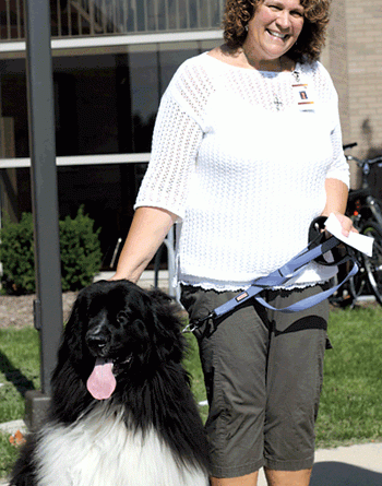 Mrs. Julie Peters brought her 3-year-old Newfoundland, Simon, to Saint Elizabeth Ann Seton’s animal blessing.