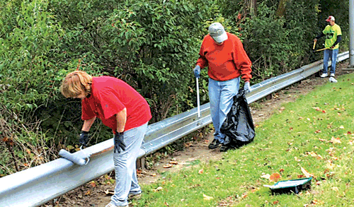 (l-r) residents of Winterset Association Deb Pruitt, Jay Brower and Steve Binkley who volunteered their time and efforts. Members of the Waynedale community gathered on Saturday to collect 8 garbage bags of trash and prime the guardrails before painting at the intersection of Fairfield and Tillman Roads. Painting will be done this Saturday, October 22nd.  Contact Camille Garrison at 415-7741 for further information or to volunteer.