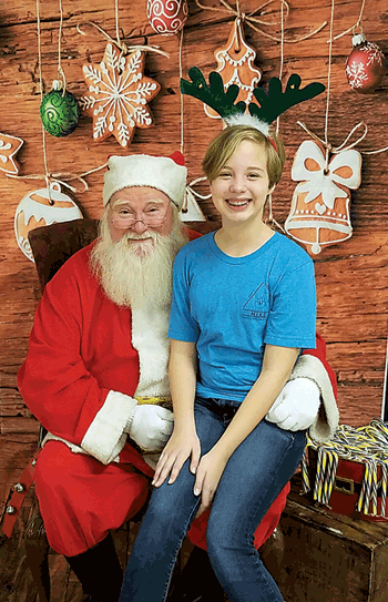 Jesse Randolph, youth coordinator with Job’s Daughters, created the event called Cocoa and Cookies With Santa.